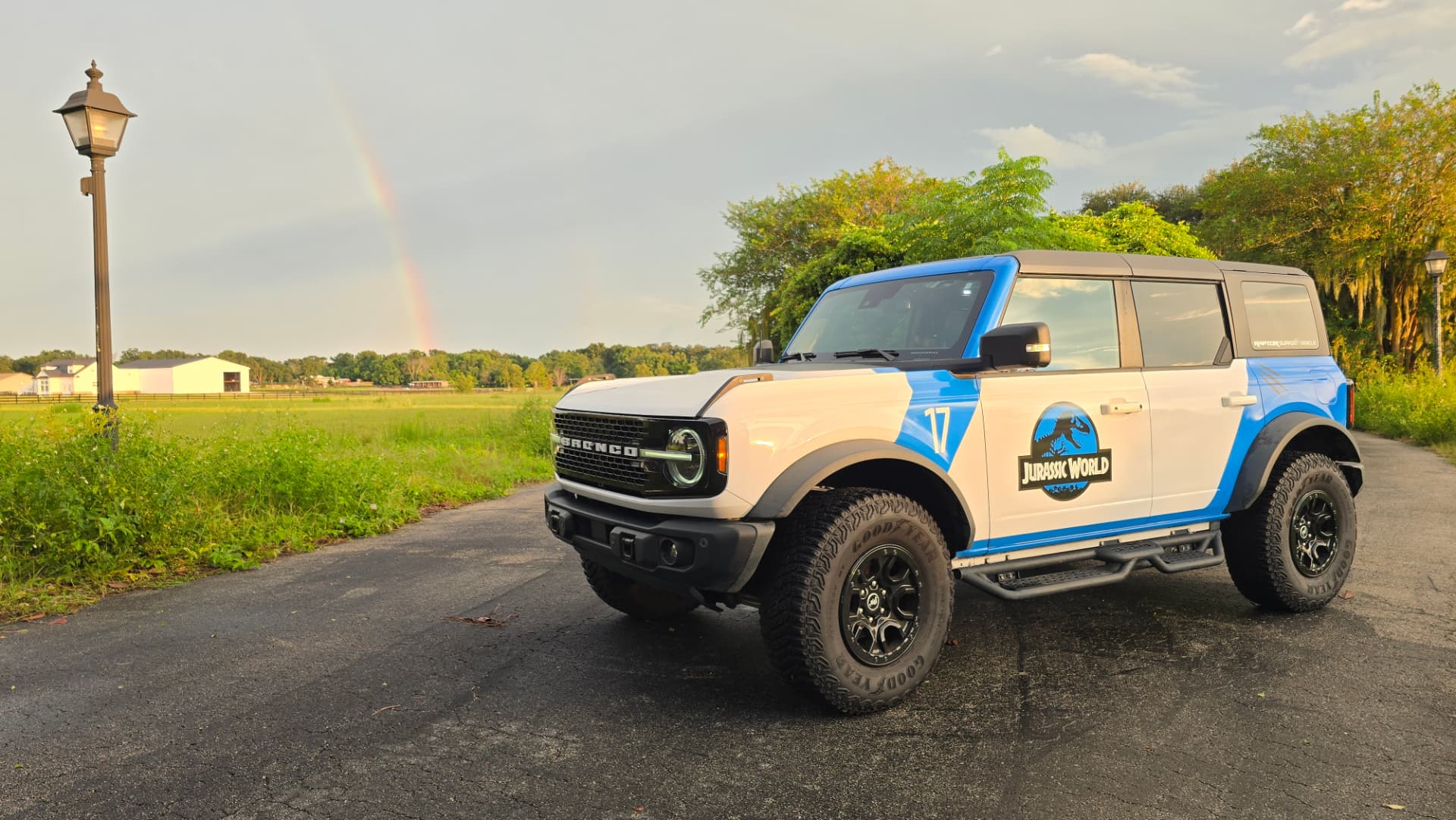 Front three quarter view of the white and blue Jurassic World Bronco