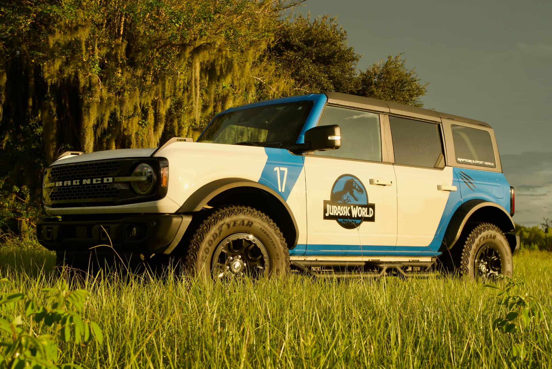 Front quarter view of the Jurassic World wrapped Bronco Wildtrak at golden hour